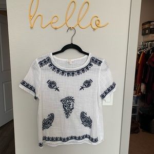 White shirt with blue pattern